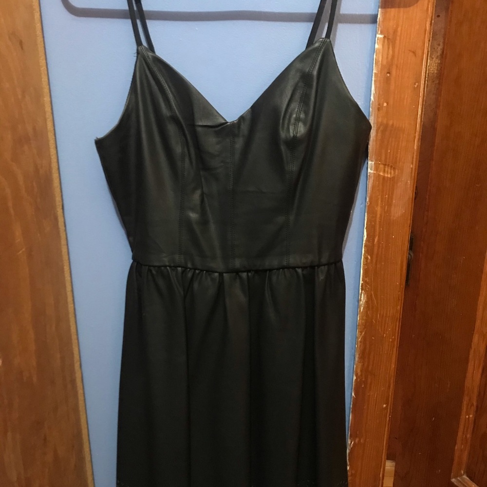 Faux leather super cute black dress with cut outs